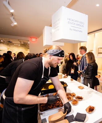 Food offerings included barbecue duck wings, blue crab tostadas, tamales, New York–style pizza and gelato