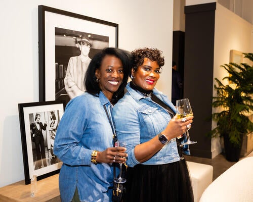 Almost 1,800 guests wandered throughout the two-story showroom, enjoying champagne and cocktails