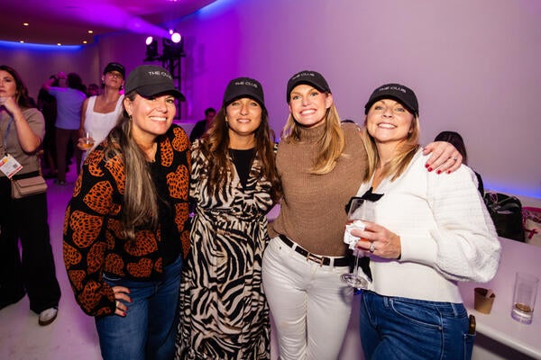 The Club was transformed for the night with music, dancing, laser lights and souvenir hats