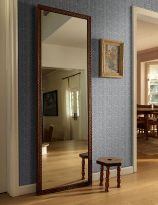 The Witt floor mirror highlights the craftsmanship and rich texture that define its timeless appeal