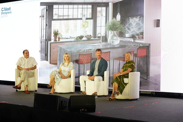 Luxe Interiors + Design’s Jill Cohen moderates a discussion on designing for wellness with Whirlpool’s Dr. Ben Hoffman and designers Stephanie Larsen and Ray Booth