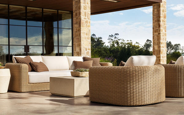 Bastien collection in all-weather wicker shown with the Terzo coffee table
