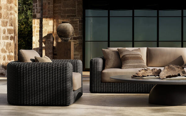 Bastien collection in all-weather wicker shown with the Terzo bowl coffee table