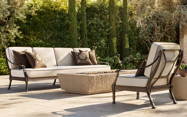 Antibes collection in all-weather aluminum shown with the Aynho fire table
