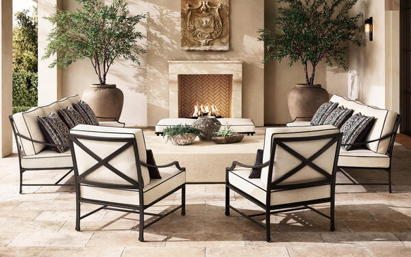 Carmel collection in all-weather aluminum shown with the Terreno coffee table
