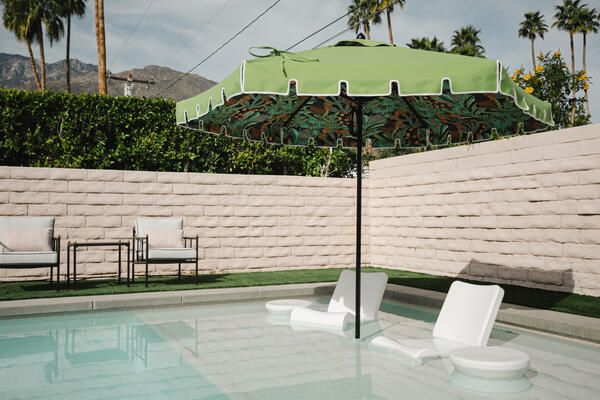 A Santa Barbara umbrella lined with Thibaut’s Iggy fabric 