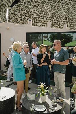 Guests mingling outside