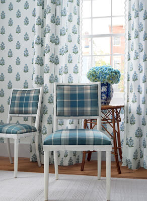 Scot's Plaid in Spa Blue and Audrey wallcovering and fabric in Blue.