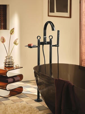 Find rounded details throughout the collection, from the Knob handles to the Halo shower head