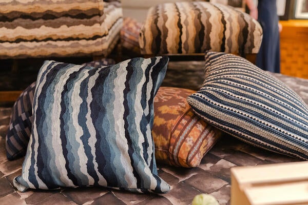 Pillows covered in  Cocuyo fabrics