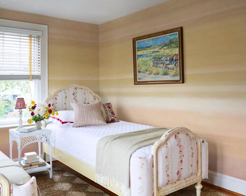 Sunset’s bands of color shift gently from warm peach to sand tones, emulating the setting sun