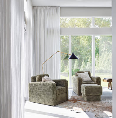 Lancaster: a modern, traditional, timeless aesthetic. Featuring 
Sterling swivel chairs, Lourdes stool