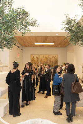 Guests mingling at the exhibition