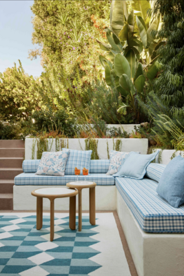 Radia drink tables; Nonna
cushions and bolsters; Al Fresco, Bambino and Aria pillows; Viva
rug in Seafoam