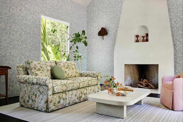 Al Fresco wallcovering and sofa, 
Whippersnapper circular pillow, Bambino chair, Allora rug