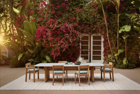 Arlette dining table with Carrara marble top, Arlette dining chairs with Bambino cushions, Allora rug
