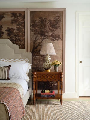 The Bamboo bedside table has a single drawer and a warm bird’s-eye maple finish