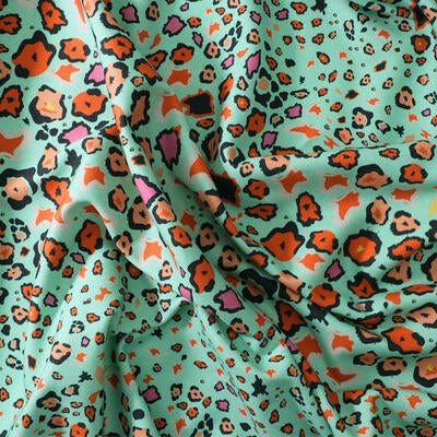 Leopard Lights linen fabric in Kingfisher
