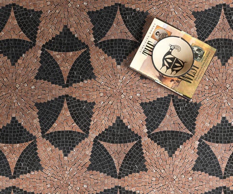 Loretta, a hand-cut stone mosaic, is part of the Saguaro collection by New Ravenna