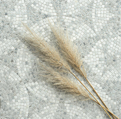 Loretta, a hand-cut stone mosaic, is part of the Saguaro collection by New Ravenna