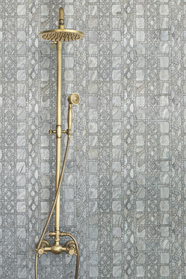 Saddleweave, a hand-cut and water-jet stone mosaic, is part of the Saguaro collection by New Ravenna