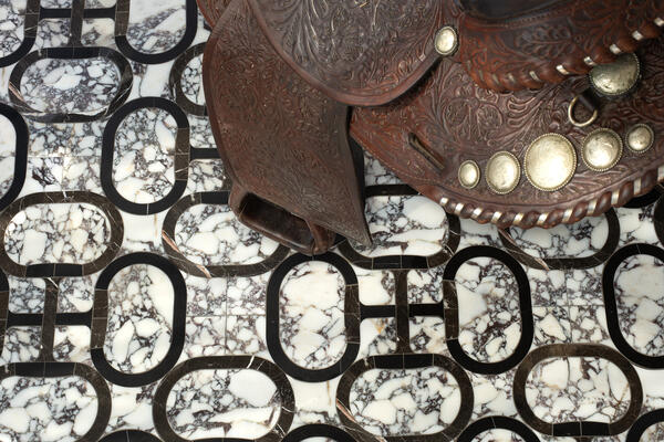 Snaffle, a water-jet stone mosaic, is part of the Saguaro collection by New Ravenna