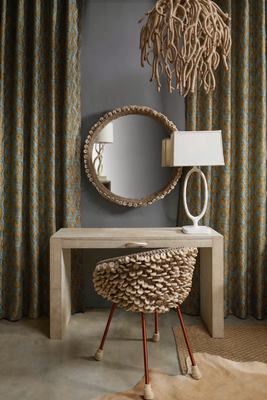 Watusi Cream cowhide console table, Chobe crocheted-leather chair, Ballito jute coral chandelier