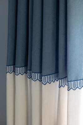 Tropic embroidered border in Blue Mirage