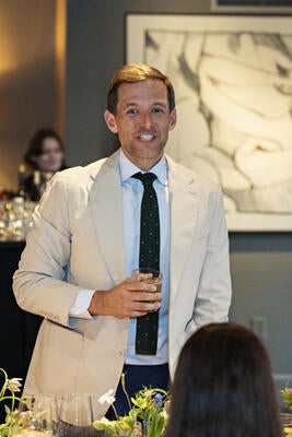 Nathan Copeland gives a toast celebrating 10 years of Highland House’s partnership with Barrie Benson