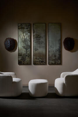 Pastorale wall plaques, Neushoorn wall sconces, Boulder swivel chairs, Boulder ottoman by Barry Dixon