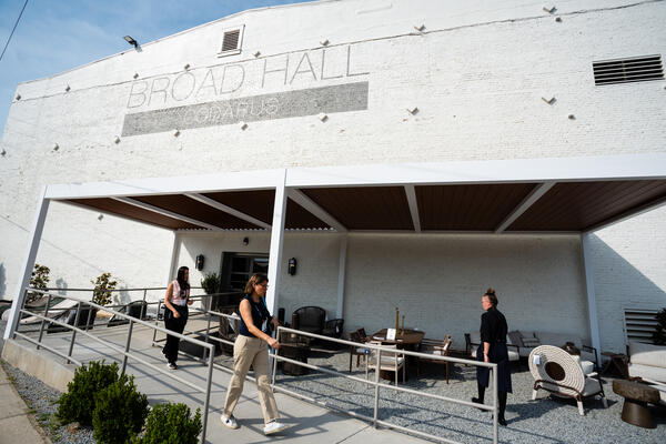 Attendees filter through Broad Hall