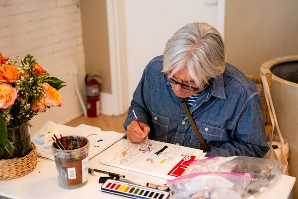 Artist Manuel Santelices paints the NKBA Design Hub in watercolor