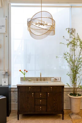 Products by James Martin Vanities, Cosentino, Kichler and Lutron inside Broad Hall
