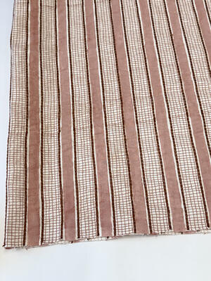 Strié hand block printed and embroidered textile in Rouge.