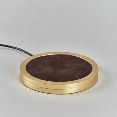 Charging base: made from solid brass, with a durable baize lining on the top recess