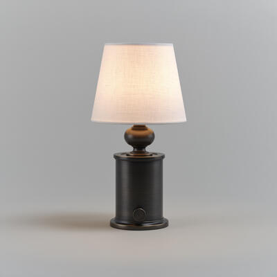 Enborne table lamp: Antique brass and distressed bronze finishes are lacquered for portable use