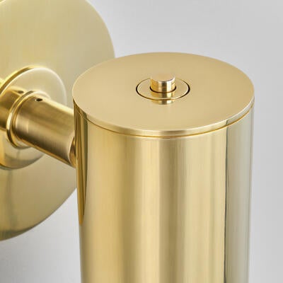 Langford wall light: An integrated push button switch takes it from function to finishing touch