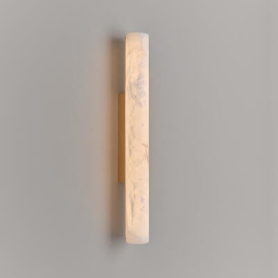 Lulworth wall light: available in three sizes, 1930s-inspired carved alabaster takes center stage