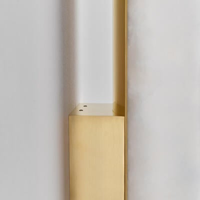 Lulworth wall light: Its solid brass bracket is finished in antique brass or polished nickel