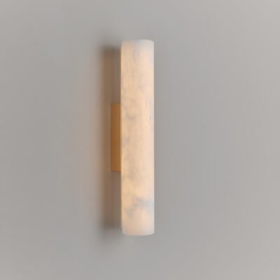 Lulworth wall light: set within a meticulously engineered cast-brass backplate