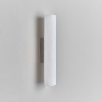 Lulworth wall light: A cast backplate is created with precisely made and machined brass components