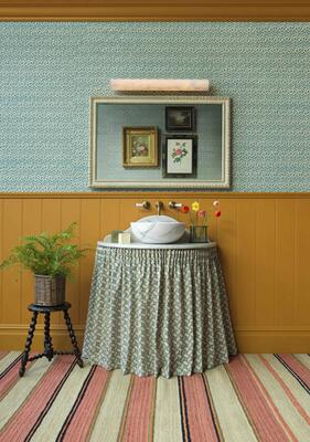 Lulworth wall light: Damp Location–rated, it can hang vertically or horizontally