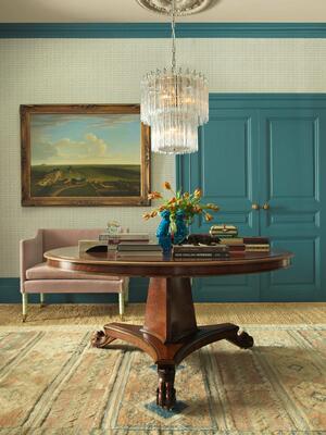 Lymington narrow chandelier: Hand-textured glass cylinders cascade from the frame, radiating light