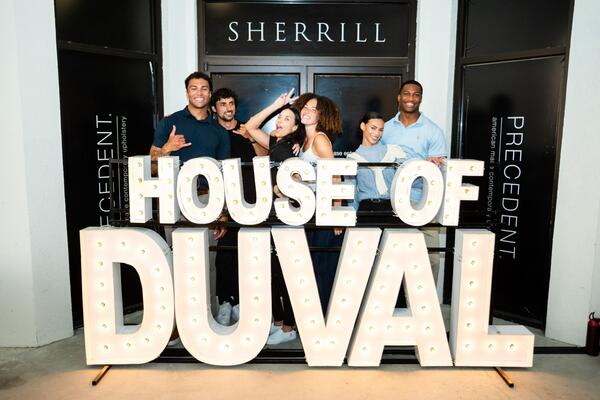 Guests strike a pose outside the Sherrill showroom