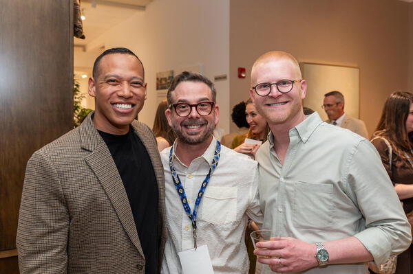 Reynolds poses with Mike and Bryan Yates of Yates Desygn