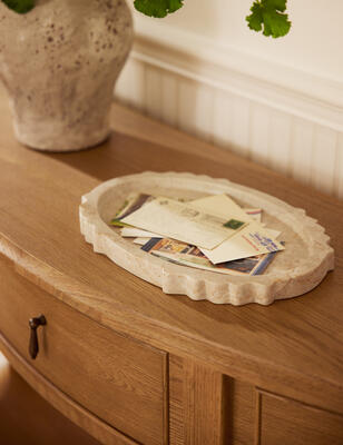 The Longton marble tray atop the Kirkham console table