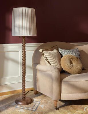 A spindle form defines the Farington floor lamp