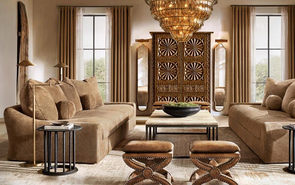 Jennifer sofa in Tan Italian Varenna suede, shown with the Valencia bar cabinet
