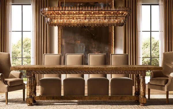 Valencia dining table in Cognac, shown with Alexandria panel-back dining chairs