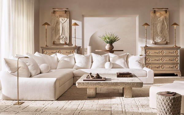 Jennifer sectional in Natural performance washed linen, shown with the Stonehenge coffee table